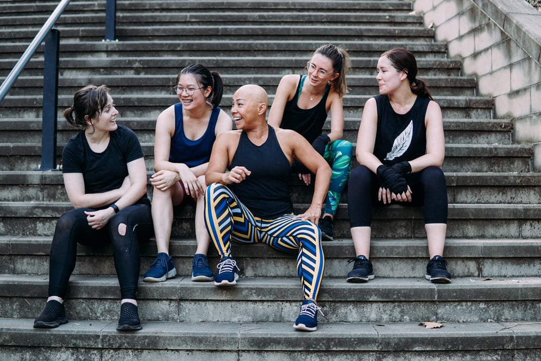 Group of active women on stairs