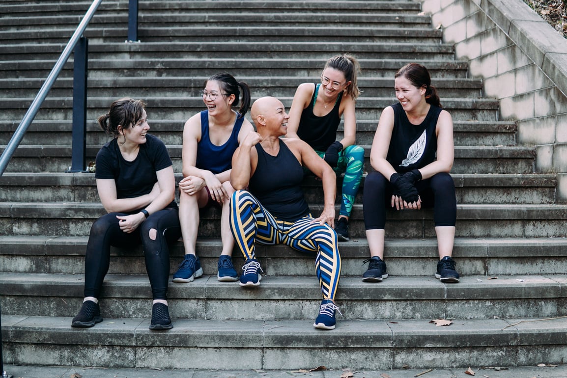 Group of active women on stairs